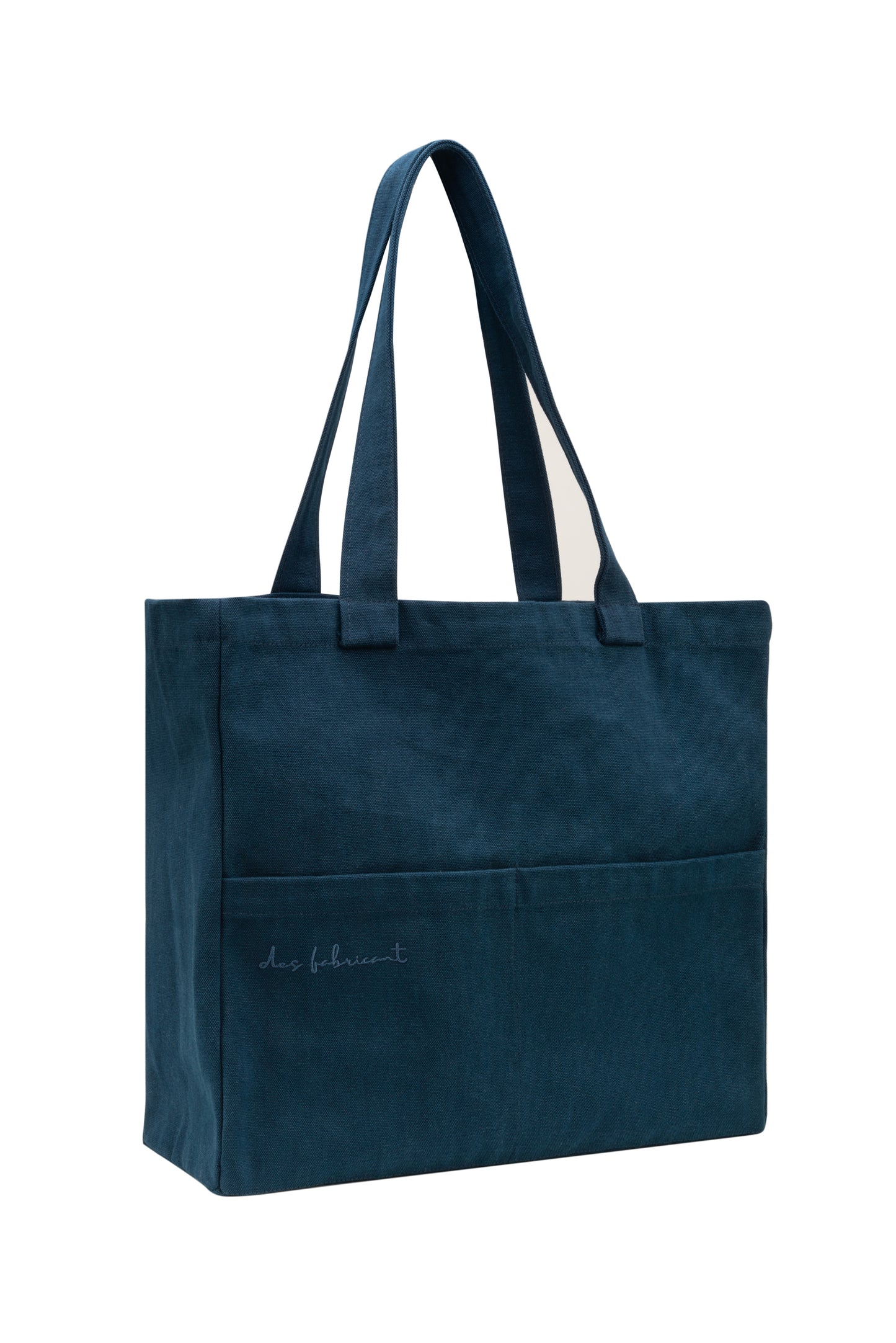 Dark blue cotton tote bag with dual front pockets and long handles - minimalist, washable,eco-friendly design by Des Fabricant.
