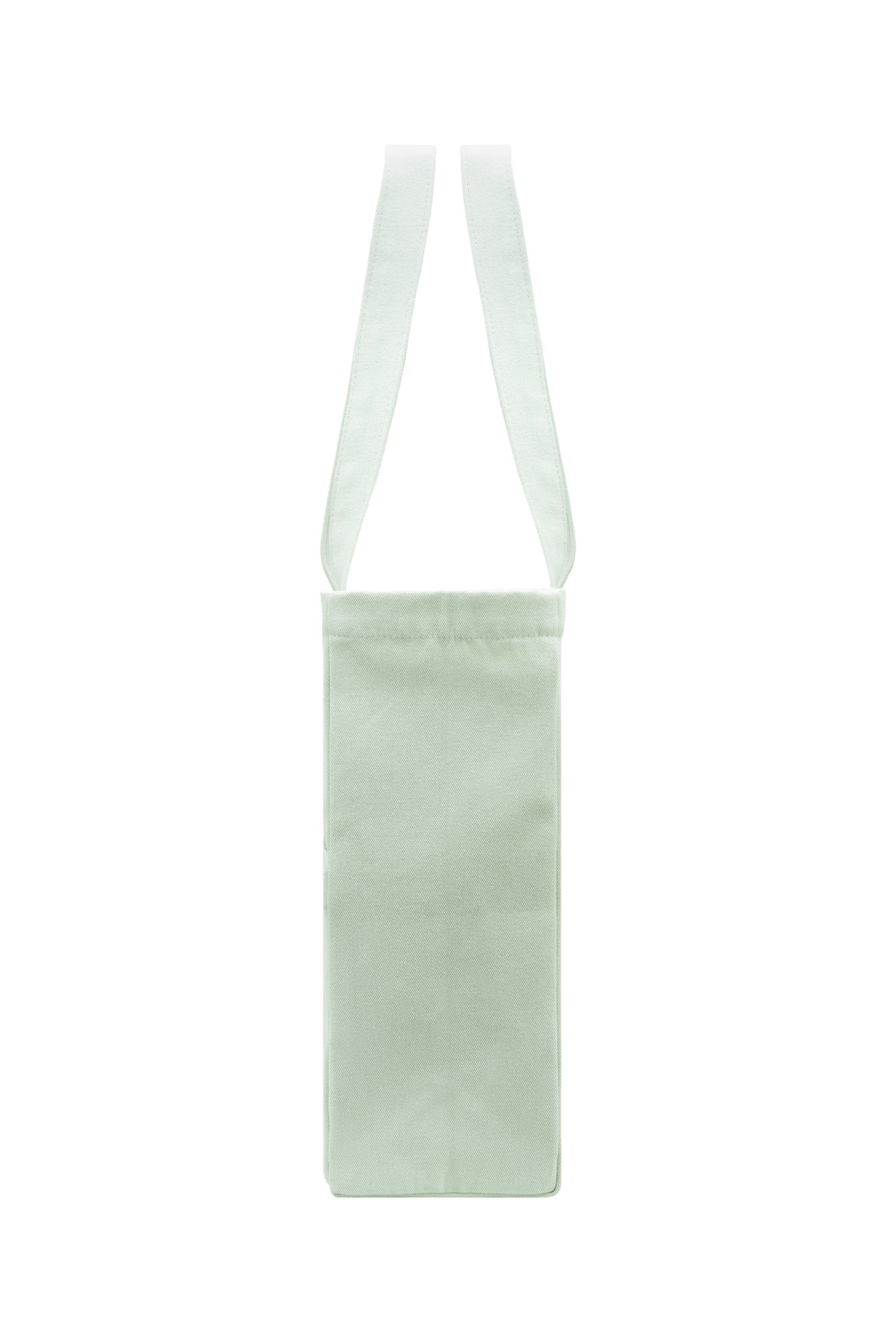Slim side profile of seafoam green cotton tote bag - structured and elegant with reinforced seams.