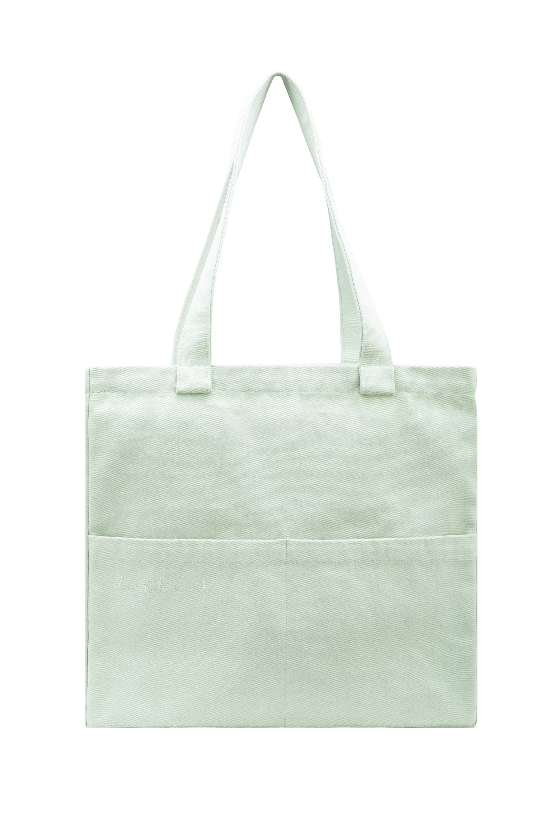 Front view of eco-friendly seafoam green tote bag with two outer pockets - made from 100% cotton by Des Fabricant.